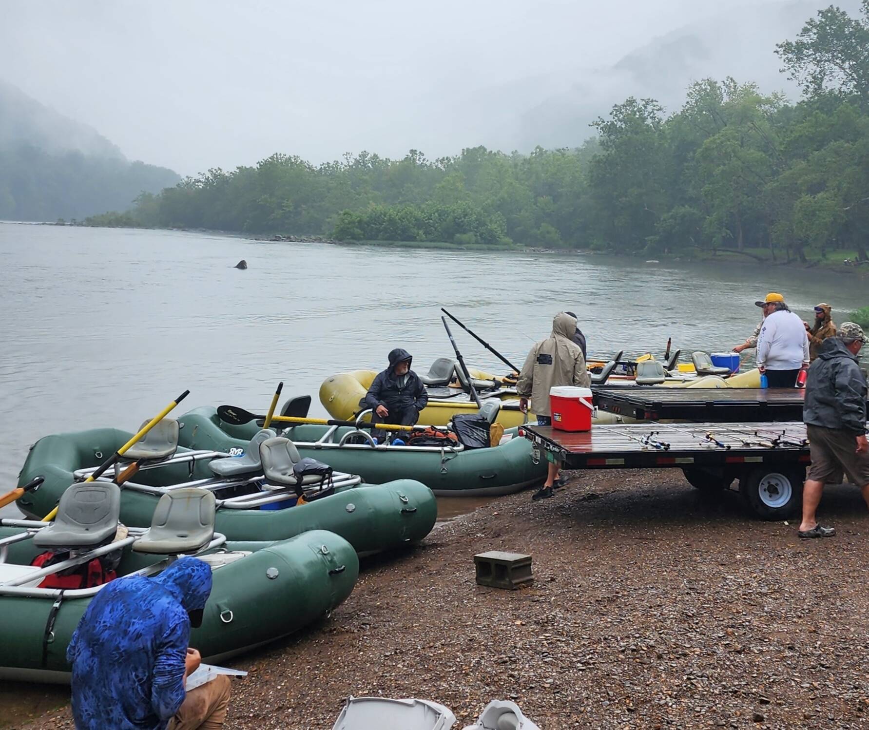 People Preparing Rafts To Go Fishing